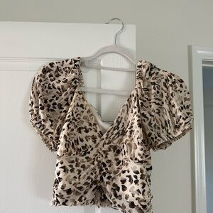 Urban outfitters cheetah print top. Cropped, very flattering.